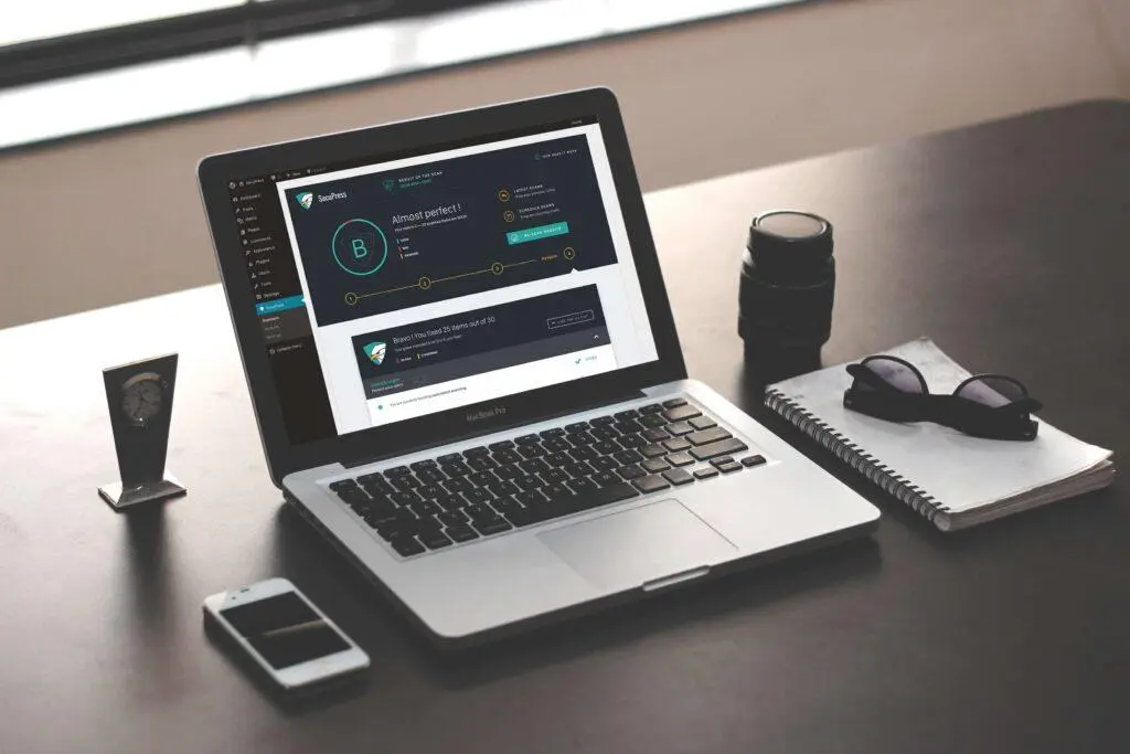 WordPress maintenance updates displayed on a laptop